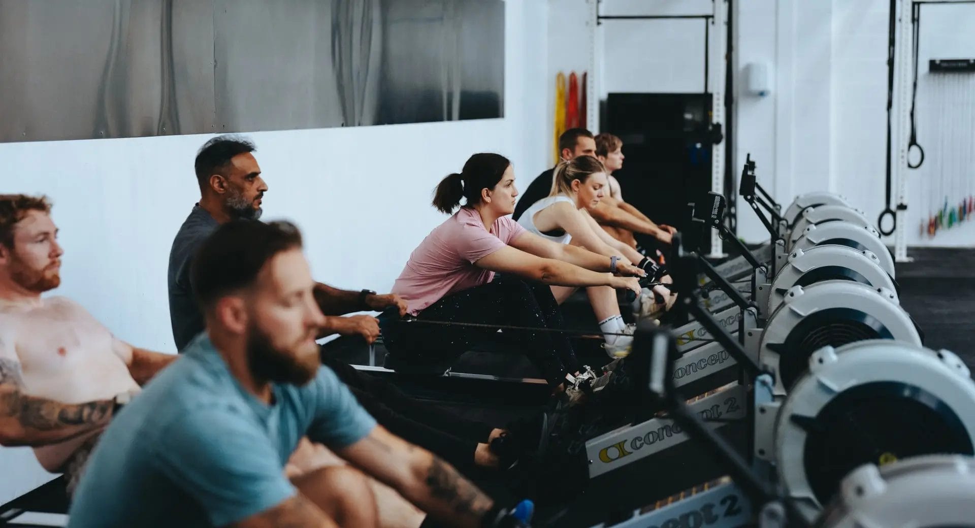 Hyrox working out rowing