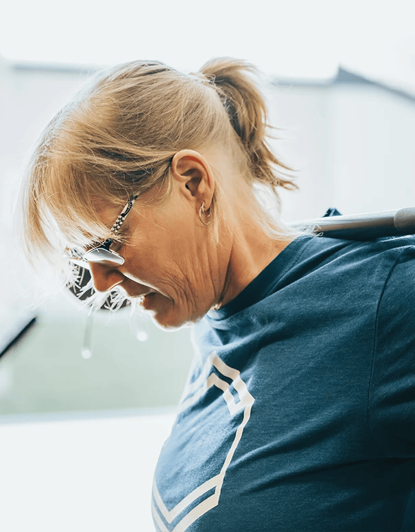 elder woman lifting weights